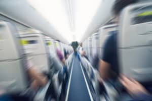 A blurry image of passengers during an airline accident