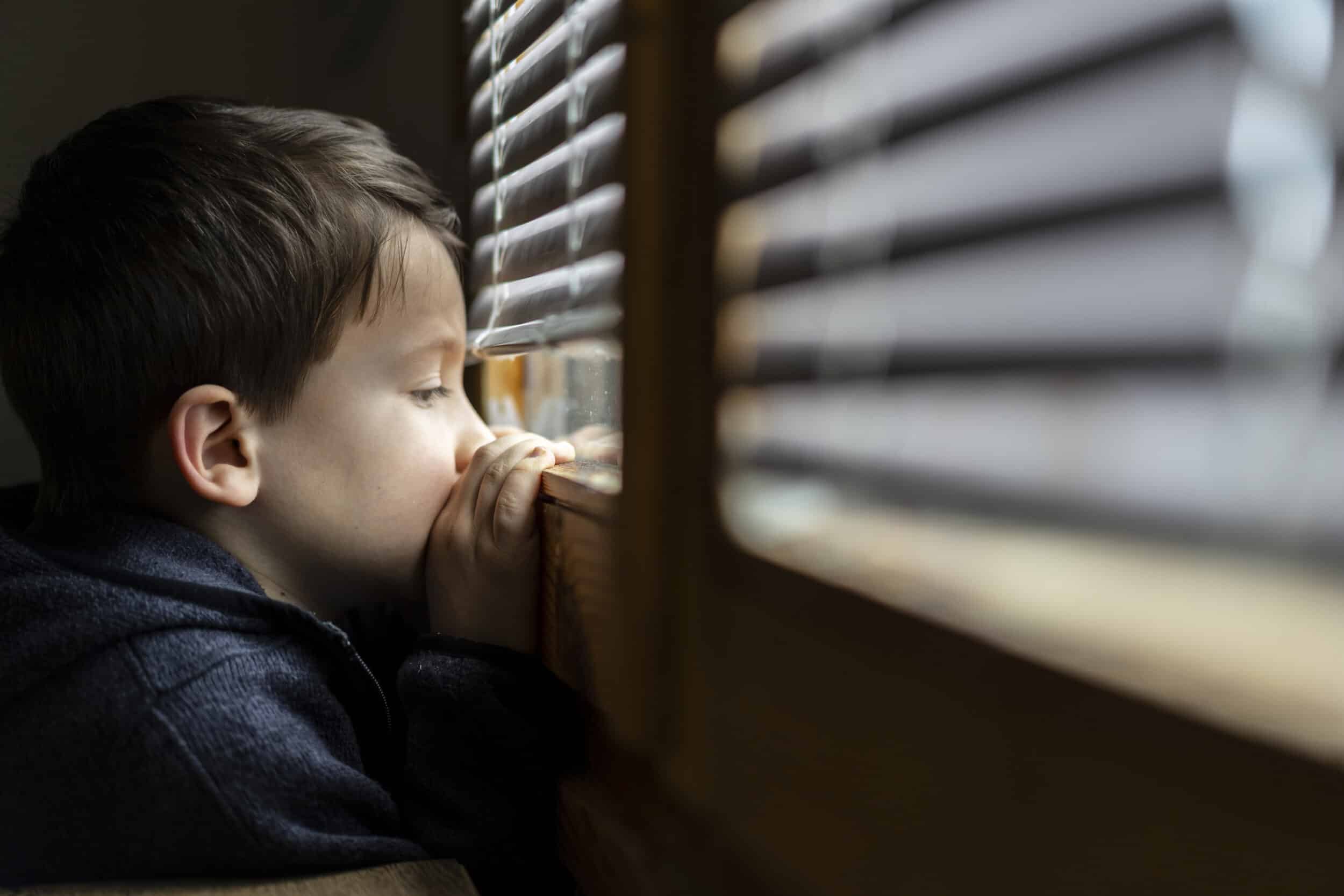 A child looking out a window
