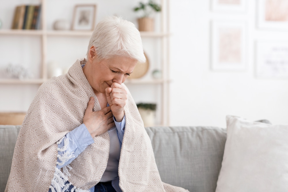 A woman with Legionnaires' disease coughing